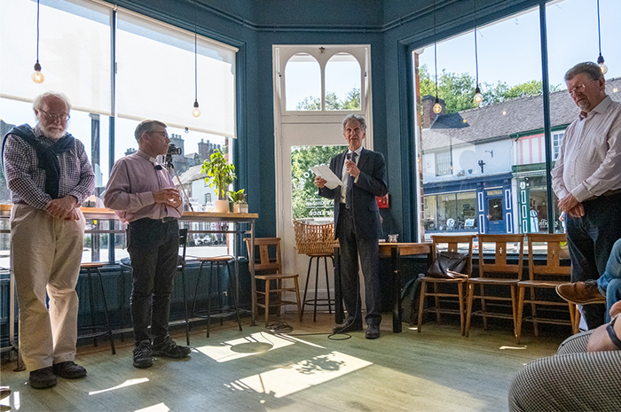 Cllr Hughes and Reverend Andy Fyle stand to give speeches at Ashbourne Methodist Church